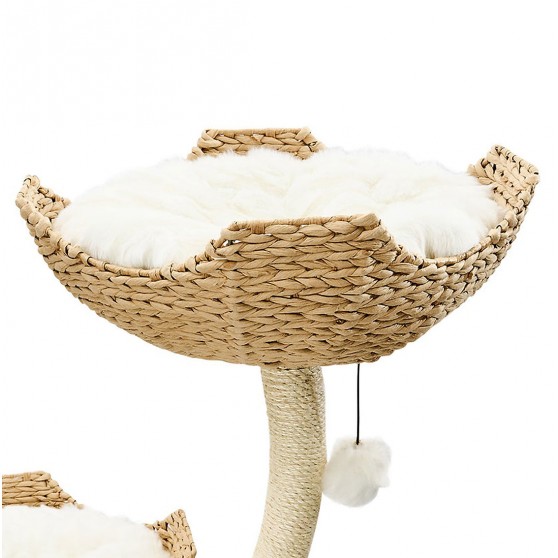 Hand-woven rattan basket with plush cushion and toy